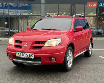 Червоний Міцубісі Аутлендер, об'ємом двигуна 2.4 л та пробігом 308 тис. км за 5990 $, фото 3 на Automoto.ua