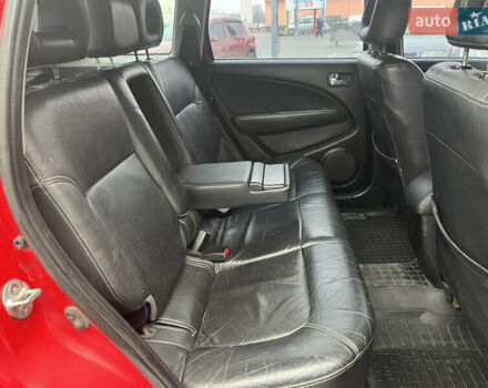 Червоний Міцубісі Аутлендер, об'ємом двигуна 2.4 л та пробігом 308 тис. км за 5990 $, фото 11 на Automoto.ua