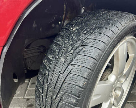 Червоний Міцубісі Аутлендер, об'ємом двигуна 2.4 л та пробігом 187 тис. км за 5600 $, фото 3 на Automoto.ua