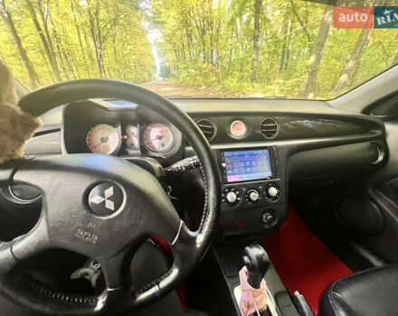 Червоний Міцубісі Аутлендер, об'ємом двигуна 2.4 л та пробігом 187 тис. км за 5600 $, фото 6 на Automoto.ua