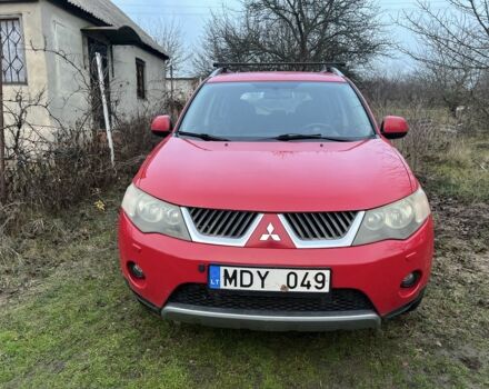 Красный Мицубиси Аутлендер, объемом двигателя 2 л и пробегом 290 тыс. км за 4700 $, фото 2 на Automoto.ua