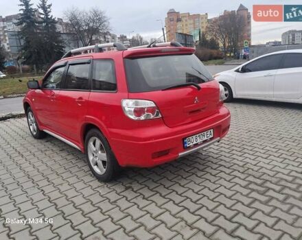 Красный Мицубиси Аутлендер, объемом двигателя 2.4 л и пробегом 269 тыс. км за 5700 $, фото 13 на Automoto.ua