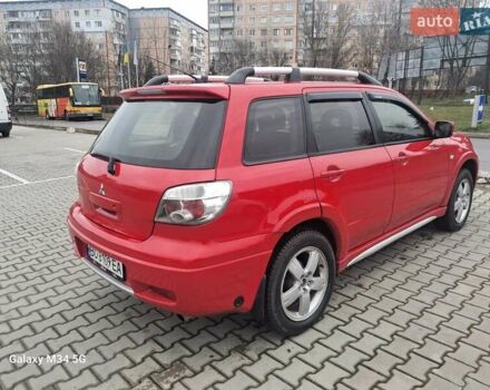 Красный Мицубиси Аутлендер, объемом двигателя 2.4 л и пробегом 269 тыс. км за 5700 $, фото 7 на Automoto.ua