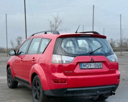 Красный Мицубиси Аутлендер, объемом двигателя 2 л и пробегом 290 тыс. км за 5200 $, фото 3 на Automoto.ua
