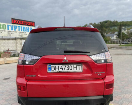Красный Мицубиси Аутлендер, объемом двигателя 3 л и пробегом 262 тыс. км за 9000 $, фото 6 на Automoto.ua