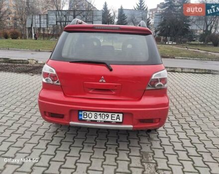 Красный Мицубиси Аутлендер, объемом двигателя 2.4 л и пробегом 269 тыс. км за 5700 $, фото 11 на Automoto.ua