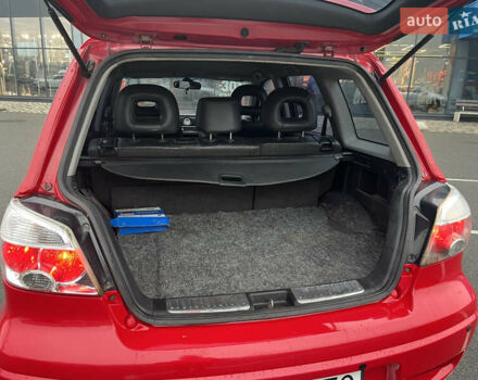 Червоний Міцубісі Аутлендер, об'ємом двигуна 2.4 л та пробігом 308 тис. км за 5990 $, фото 16 на Automoto.ua