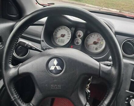 Красный Мицубиси Аутлендер, объемом двигателя 2.4 л и пробегом 269 тыс. км за 5700 $, фото 27 на Automoto.ua