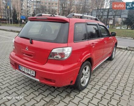Красный Мицубиси Аутлендер, объемом двигателя 2.4 л и пробегом 269 тыс. км за 5700 $, фото 10 на Automoto.ua