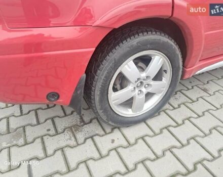 Красный Мицубиси Аутлендер, объемом двигателя 2.4 л и пробегом 269 тыс. км за 5700 $, фото 20 на Automoto.ua