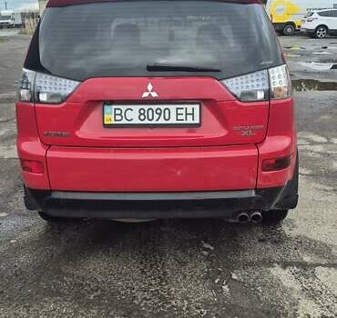 Красный Мицубиси Аутлендер, объемом двигателя 3 л и пробегом 351 тыс. км за 8000 $, фото 3 на Automoto.ua