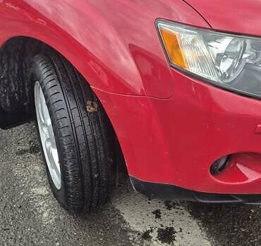 Красный Мицубиси Аутлендер, объемом двигателя 3 л и пробегом 351 тыс. км за 8000 $, фото 7 на Automoto.ua