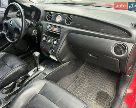 Червоний Міцубісі Аутлендер, об'ємом двигуна 2.4 л та пробігом 308 тис. км за 5990 $, фото 7 на Automoto.ua