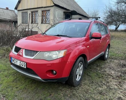 Красный Мицубиси Аутлендер, объемом двигателя 2 л и пробегом 290 тыс. км за 4700 $, фото 1 на Automoto.ua