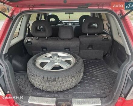 Красный Мицубиси Аутлендер, объемом двигателя 2.4 л и пробегом 269 тыс. км за 5700 $, фото 18 на Automoto.ua