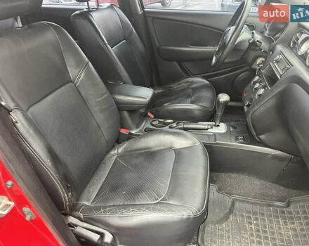 Червоний Міцубісі Аутлендер, об'ємом двигуна 2.4 л та пробігом 308 тис. км за 5990 $, фото 8 на Automoto.ua