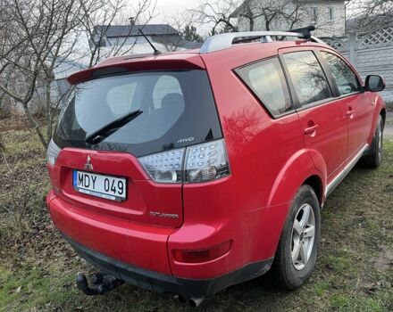 Красный Мицубиси Аутлендер, объемом двигателя 2 л и пробегом 290 тыс. км за 4700 $, фото 3 на Automoto.ua