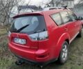 Красный Мицубиси Аутлендер, объемом двигателя 2 л и пробегом 290 тыс. км за 4700 $, фото 3 на Automoto.ua