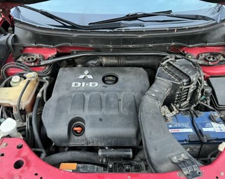 Красный Мицубиси Аутлендер, объемом двигателя 2 л и пробегом 290 тыс. км за 4700 $, фото 7 на Automoto.ua