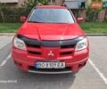 Красный Мицубиси Аутлендер, объемом двигателя 2.4 л и пробегом 265 тыс. км за 5300 $, фото 8 на Automoto.ua