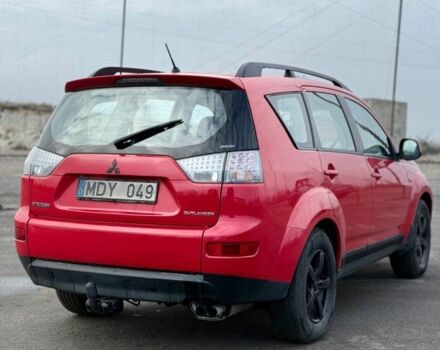 Красный Мицубиси Аутлендер, объемом двигателя 2 л и пробегом 290 тыс. км за 5200 $, фото 2 на Automoto.ua