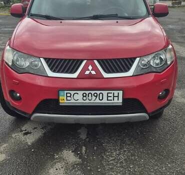 Красный Мицубиси Аутлендер, объемом двигателя 3 л и пробегом 351 тыс. км за 8000 $, фото 1 на Automoto.ua