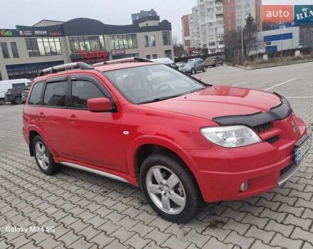 Красный Мицубиси Аутлендер, объемом двигателя 2.4 л и пробегом 269 тыс. км за 5700 $, фото 6 на Automoto.ua