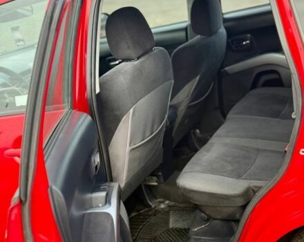 Красный Мицубиси Аутлендер, объемом двигателя 2 л и пробегом 290 тыс. км за 5200 $, фото 6 на Automoto.ua