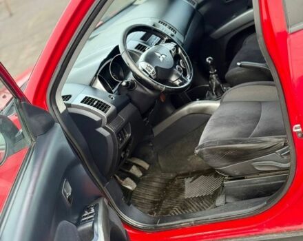 Красный Мицубиси Аутлендер, объемом двигателя 2 л и пробегом 290 тыс. км за 5200 $, фото 5 на Automoto.ua