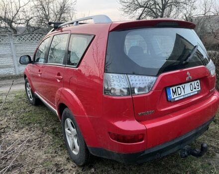 Красный Мицубиси Аутлендер, объемом двигателя 2 л и пробегом 290 тыс. км за 4700 $, фото 4 на Automoto.ua