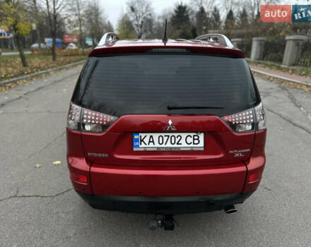 Красный Мицубиси Аутлендер, объемом двигателя 2.4 л и пробегом 180 тыс. км за 8900 $, фото 16 на Automoto.ua