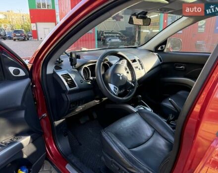 Красный Мицубиси Аутлендер, объемом двигателя 2.36 л и пробегом 143 тыс. км за 8500 $, фото 11 на Automoto.ua