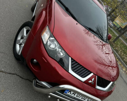 Красный Мицубиси Аутлендер, объемом двигателя 2.4 л и пробегом 180 тыс. км за 8900 $, фото 25 на Automoto.ua