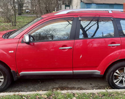 Красный Мицубиси Аутлендер, объемом двигателя 2.36 л и пробегом 306 тыс. км за 9300 $, фото 2 на Automoto.ua