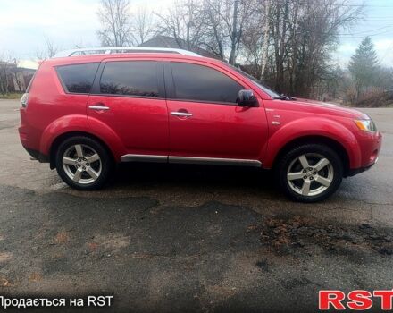 Красный Мицубиси Аутлендер, объемом двигателя 3 л и пробегом 205 тыс. км за 9000 $, фото 5 на Automoto.ua