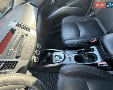 Красный Мицубиси Аутлендер, объемом двигателя 2.36 л и пробегом 143 тыс. км за 8500 $, фото 9 на Automoto.ua