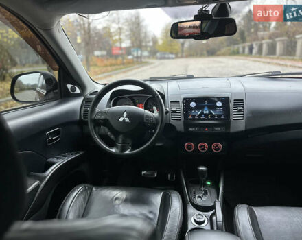 Красный Мицубиси Аутлендер, объемом двигателя 2.4 л и пробегом 180 тыс. км за 8900 $, фото 32 на Automoto.ua