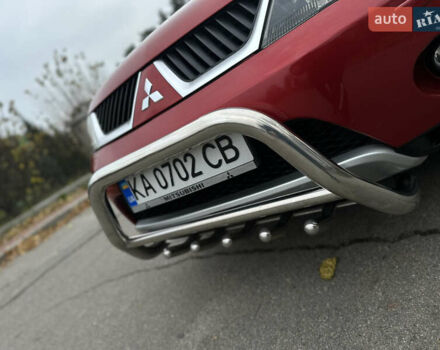 Красный Мицубиси Аутлендер, объемом двигателя 2.4 л и пробегом 180 тыс. км за 8900 $, фото 26 на Automoto.ua