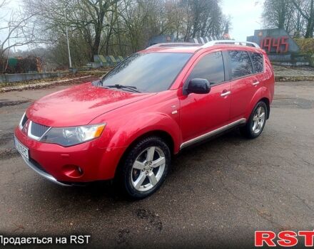 Красный Мицубиси Аутлендер, объемом двигателя 3 л и пробегом 205 тыс. км за 9000 $, фото 1 на Automoto.ua