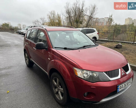 Красный Мицубиси Аутлендер, объемом двигателя 3 л и пробегом 204 тыс. км за 8200 $, фото 3 на Automoto.ua