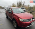 Красный Мицубиси Аутлендер, объемом двигателя 3 л и пробегом 204 тыс. км за 8200 $, фото 3 на Automoto.ua