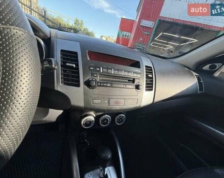 Красный Мицубиси Аутлендер, объемом двигателя 2.36 л и пробегом 143 тыс. км за 8500 $, фото 10 на Automoto.ua