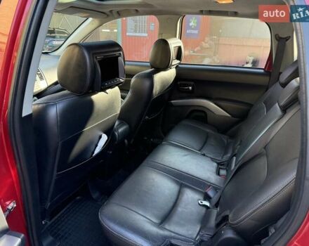 Красный Мицубиси Аутлендер, объемом двигателя 2.36 л и пробегом 143 тыс. км за 8500 $, фото 14 на Automoto.ua