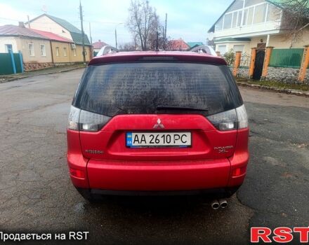 Красный Мицубиси Аутлендер, объемом двигателя 3 л и пробегом 205 тыс. км за 9000 $, фото 3 на Automoto.ua