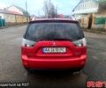 Красный Мицубиси Аутлендер, объемом двигателя 3 л и пробегом 205 тыс. км за 9000 $, фото 3 на Automoto.ua