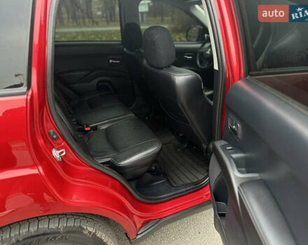 Красный Мицубиси Аутлендер, объемом двигателя 2.4 л и пробегом 180 тыс. км за 8900 $, фото 37 на Automoto.ua