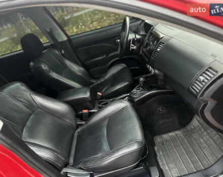 Красный Мицубиси Аутлендер, объемом двигателя 2.4 л и пробегом 180 тыс. км за 8900 $, фото 41 на Automoto.ua