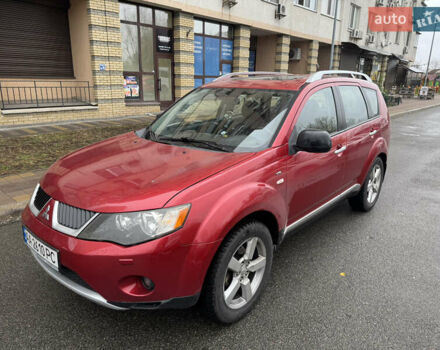 Красный Мицубиси Аутлендер, объемом двигателя 3 л и пробегом 204 тыс. км за 8200 $, фото 1 на Automoto.ua