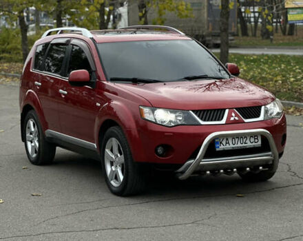 Красный Мицубиси Аутлендер, объемом двигателя 2.4 л и пробегом 180 тыс. км за 8900 $, фото 4 на Automoto.ua