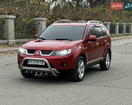 Красный Мицубиси Аутлендер, объемом двигателя 2.4 л и пробегом 180 тыс. км за 8900 $, фото 3 на Automoto.ua